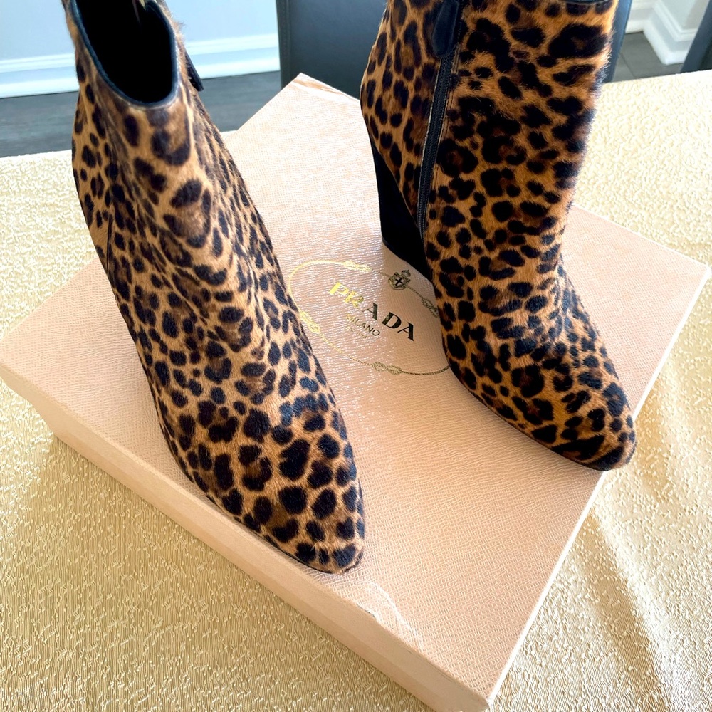 Brand new Prada genuine pony hair cheetah pattern booties in original box.
